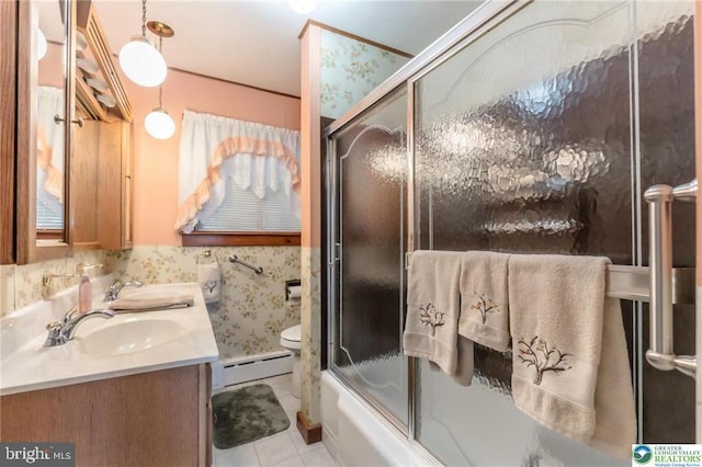 bathroom featuring a sink, tile patterned floors, a baseboard radiator, and double vanity