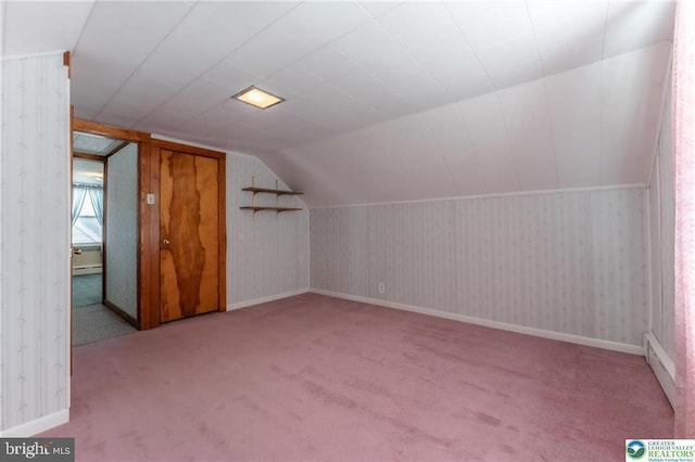 bonus room featuring carpet flooring, vaulted ceiling, and baseboard heating