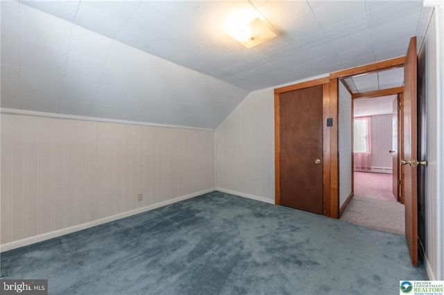 bonus room with baseboards, carpet flooring, and vaulted ceiling