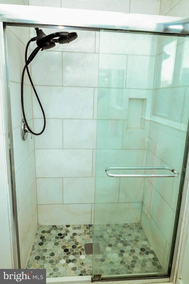 bathroom featuring a stall shower