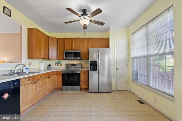 2420 Huntwood Ct, Frederick, MD 21702 - kitchen featuring stainless steel appliances, light countertops, visible vents, a sink, and ceiling fan