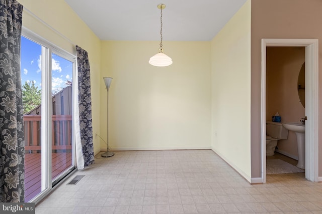2420 Huntwood Ct, Frederick, MD 21702 - unfurnished dining area with light floors, baseboards, and a sink