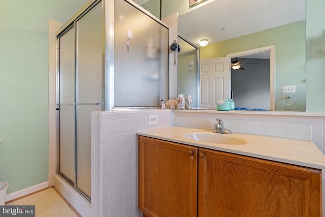 2420 Huntwood Ct, Frederick, MD 21702 - full bathroom featuring tile patterned flooring, vanity, ceiling fan, and a stall shower