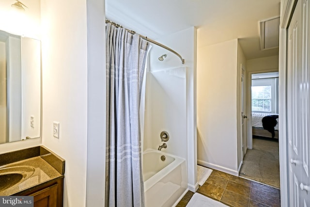 bathroom with vanity, baseboards, and shower / bath combination with curtain