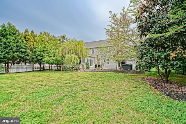 view of yard with fence