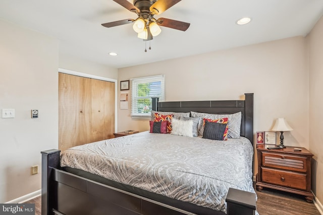 bedroom featuring recessed lighting, wood finished floors, a closet, ceiling fan, and baseboards