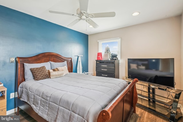 bedroom with wood finished floors, ceiling fan, recessed lighting, and baseboards