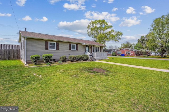 single story home featuring fence, covered porch, and a front yard