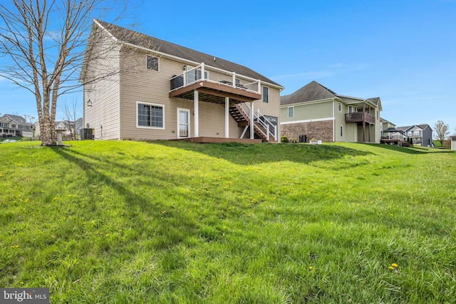 5 Raven Way, Shippensburg, PA 17257 - back of house featuring a wooden deck, a lawn, central AC, and stairs
