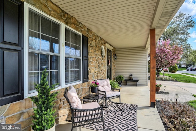 view of patio featuring a porch