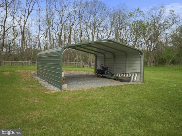 view of car parking featuring a detached carport and driveway