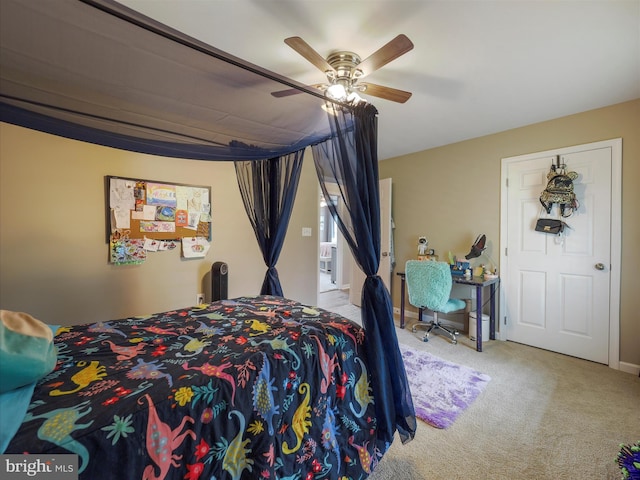 carpeted bedroom featuring a ceiling fan