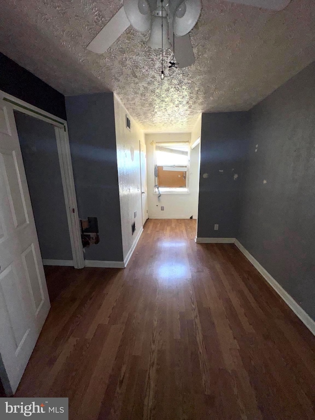 7437 Berkshire Rd, Baltimore, MD 21224 - unfurnished dining area featuring wood finished floors and baseboards