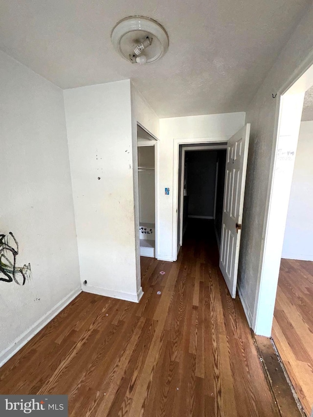 7437 Berkshire Rd, Baltimore, MD 21224 - hallway with wood finished floors and baseboards