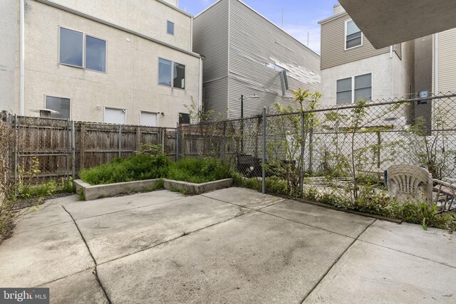 view of patio / terrace featuring fence private yard