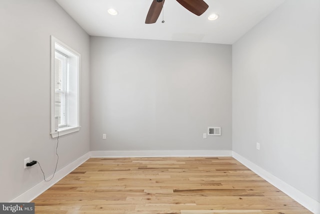 empty room with recessed lighting, light wood-type flooring, visible vents, and ceiling fan
