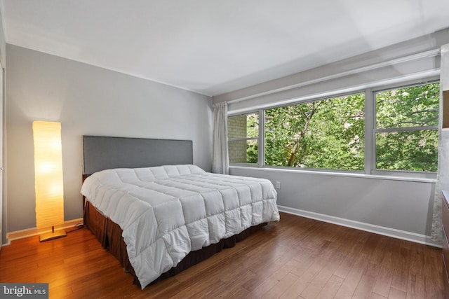 18 Canterbury Sq Unit 302, Alexandria, VA 22304 - bedroom with baseboards and hardwood / wood-style flooring