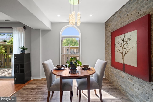 18 Canterbury Sq Unit 302, Alexandria, VA 22304 - dining area with visible vents, an accent wall, wood finished floors, baseboards, and recessed lighting