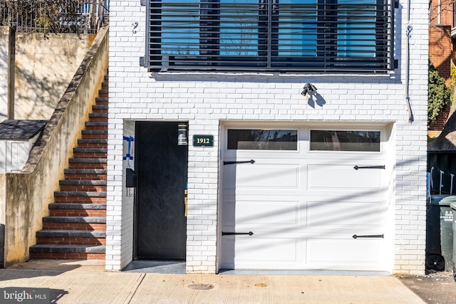 exterior space featuring brick siding