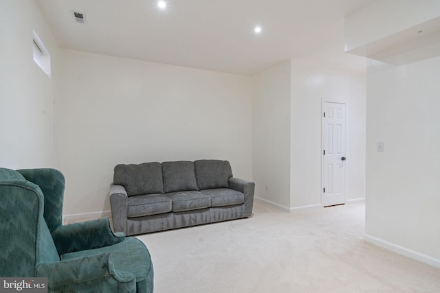 living area with carpet floors, baseboards, recessed lighting, and visible vents