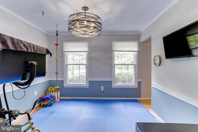 4011 Hummer Rd, Annandale, VA 22003 - workout area featuring wood finished floors, a chandelier, crown molding, and baseboards