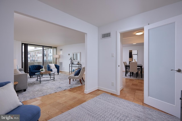 interior space with visible vents and baseboards