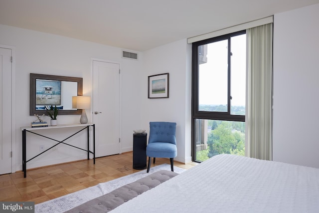 bedroom with visible vents