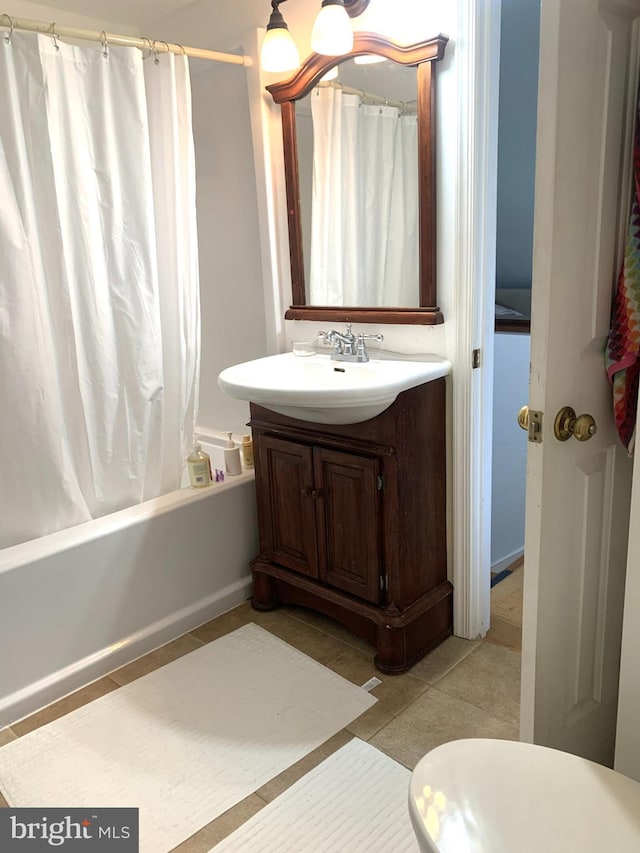3903 8th St S, Arlington, VA 22204 - bathroom with vanity, shower / bath combination with curtain, tile patterned flooring, and toilet