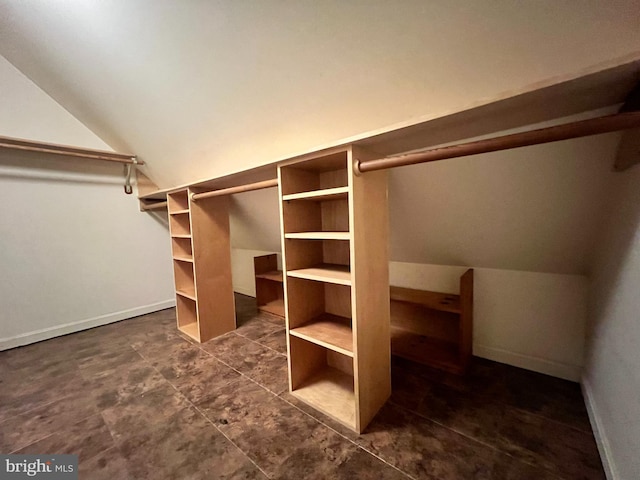 3903 8th St S, Arlington, VA 22204 - spacious closet with vaulted ceiling and dark tile patterned flooring