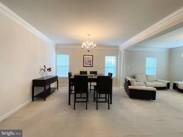 3648 Holborn Pl Unit 3648, Frederick, MD 21704 - dining space with crown molding, baseboards, light carpet, and an inviting chandelier