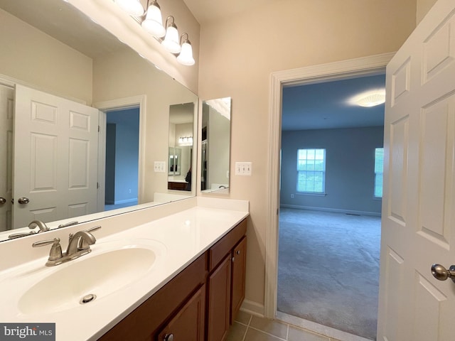 3648 Holborn Pl Unit 3648, Frederick, MD 21704 - bathroom featuring baseboards, vanity, and tile patterned flooring