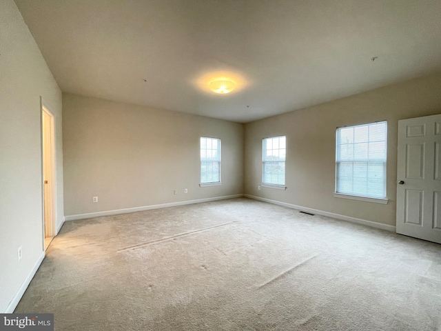 3648 Holborn Pl Unit 3648, Frederick, MD 21704 - empty room featuring baseboards, visible vents, and light colored carpet