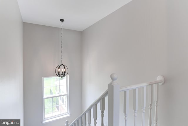 interior details featuring a notable chandelier