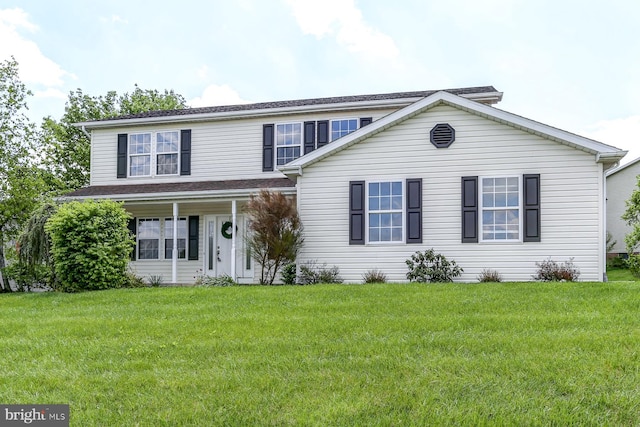 traditional home with a front lawn
