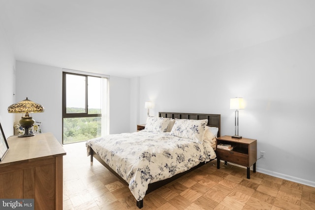 4620 N Park Ave Unit 1508E, Chevy Chase, MD 20815 - bedroom featuring baseboards