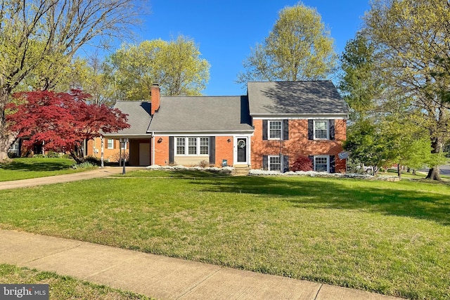 4500 Hadrian Ct, Alexandria, VA 22310 - tri-level home featuring concrete driveway, a front lawn, a chimney, and a carport