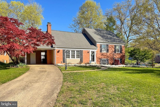 4500 Hadrian Ct, Alexandria, VA 22310 - tri-level home featuring a front yard, a chimney, driveway, and brick siding