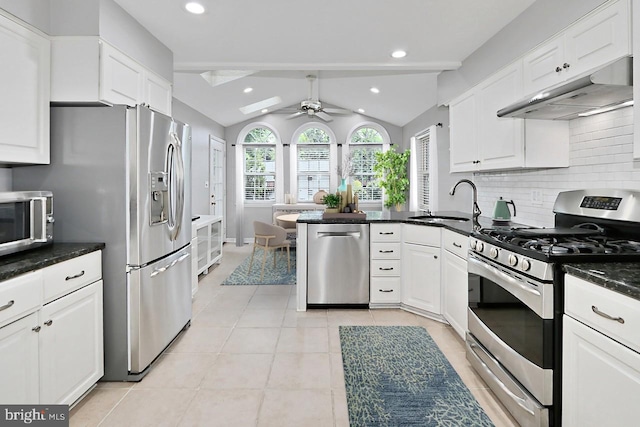 4500 Hadrian Ct, Alexandria, VA 22310 - kitchen with appliances with stainless steel finishes, under cabinet range hood, a sink, a ceiling fan, and white cabinets