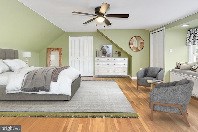 4500 Hadrian Ct, Alexandria, VA 22310 - bedroom featuring multiple closets, wood finished floors, ceiling fan, vaulted ceiling, and baseboards