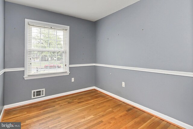 4500 Hadrian Ct, Alexandria, VA 22310 - unfurnished room featuring wood finished floors and baseboards