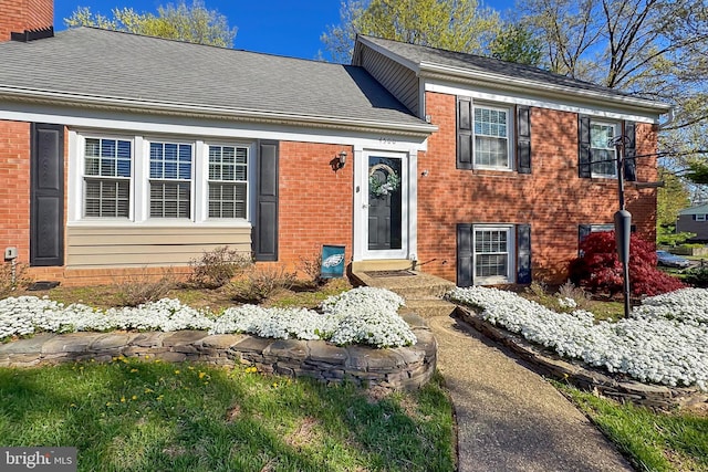4500 Hadrian Ct, Alexandria, VA 22310 - split level home with brick siding and a shingled roof