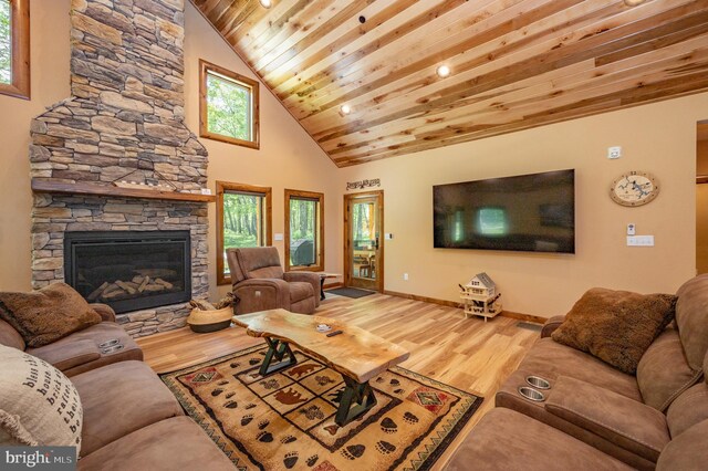 17 Green Jacket Ct, Mc Henry, MD 21541 - living room featuring baseboards, wooden ceiling, a fireplace, wood finished floors, and high vaulted ceiling