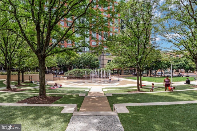surrounding community with a yard