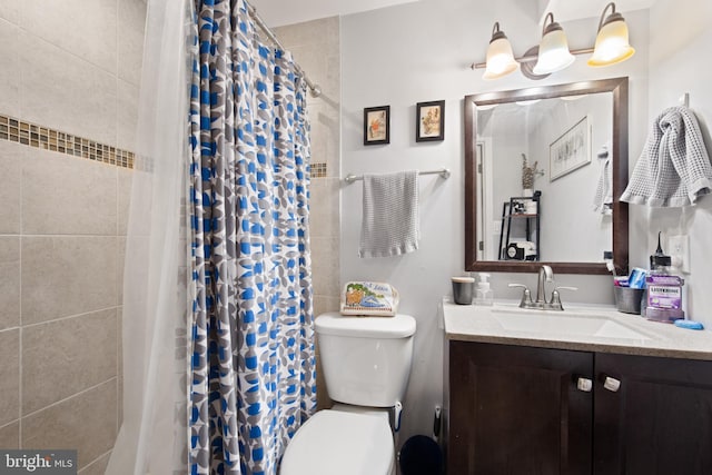 728 Farragut St NW, Washington, DC 20011 - full bath with toilet, tiled shower, and vanity