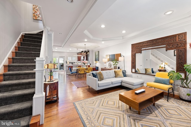 728 Farragut St NW, Washington, DC 20011 - living area featuring ornamental molding, stairs, recessed lighting, light wood-type flooring, and a chandelier