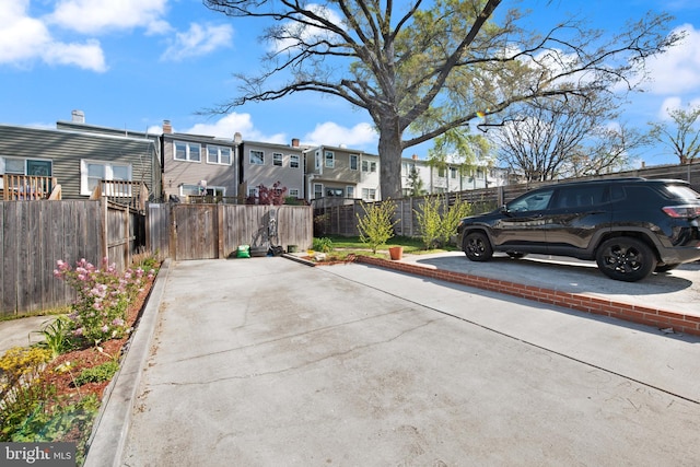 728 Farragut St NW, Washington, DC 20011 - view of vehicle parking featuring fence and a residential view