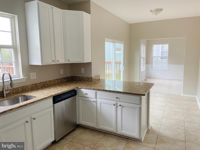 190 Wynnefield Rd, Bear, DE 19701 - kitchen featuring stainless steel dishwasher, a sink, a peninsula, and light tile patterned floors