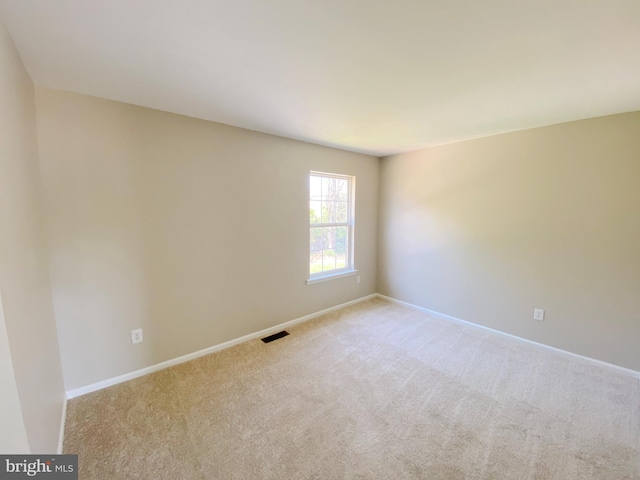190 Wynnefield Rd, Bear, DE 19701 - spare room featuring visible vents, baseboards, and light carpet