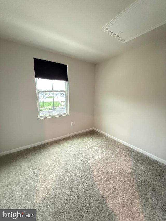 506 Red Bill Ln, Cambridge, MD 21613 - carpeted spare room with attic access and baseboards
