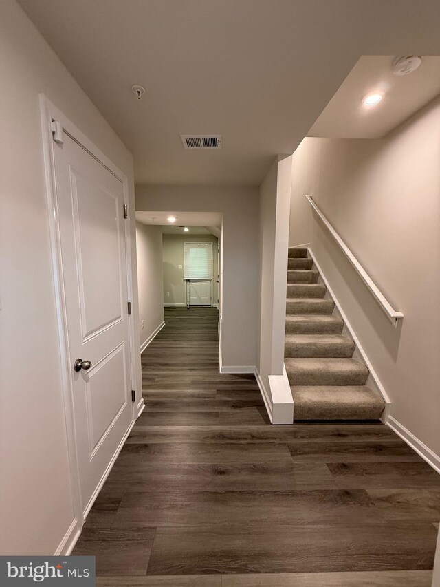 506 Red Bill Ln, Cambridge, MD 21613 - corridor with visible vents, baseboards, recessed lighting, dark wood finished floors, and stairs